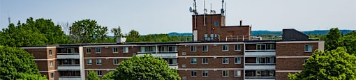 Trillium Apartments drone image of front of building in Cobourg, ON