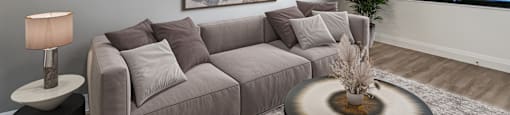 a living room with a couch at Trio on Belmont in Kitchener ON