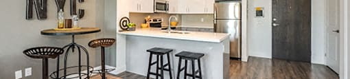 Trio on Belmont kitchen with built-in breakfast bar in Kitchener, ON