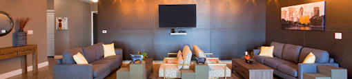 Trio On Belmont lounge with comfy couch seating area in Kitchener, ON