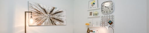 Den, set up as a home office with a desk and chair, in a 2 bed + den 2 bath variation E in building A at Trio on Belmont in Kitchener, ON