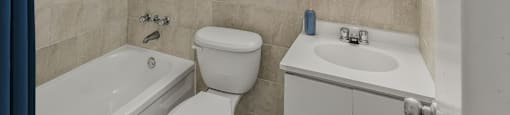 Bathroom with tub, shower, toilet Village Tower Toronto ON