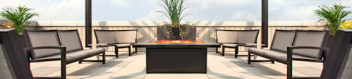 Watson Park Apartments roof top terrace featuring lounge seating and gazebo in Guelph, ON