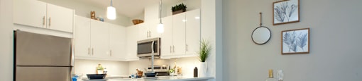 Watson Park Apartments kitchen featuring breakfast bar in Guelph, ON