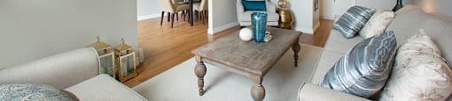 Squire Court living room with view into dining room in ST. Catharines, ON