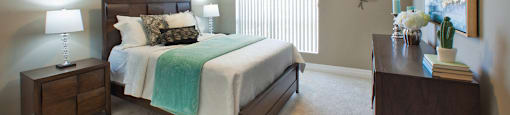 Juliana Place Apartments bedroom featuring large window in Woodstock, ON