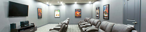 Juliana Place Apartments theater featuring reclining seating in Woodstock, ON