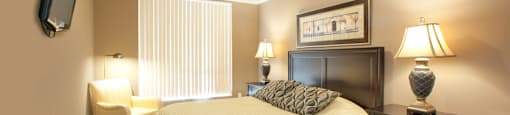 Building 505 guest suite sleeping area with Queen size bed