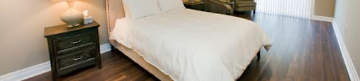 Building 515 guest suite sleeping area with Queen size bed