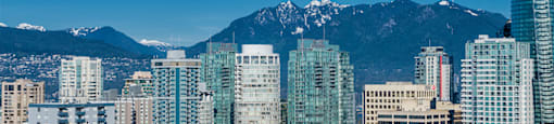 High rises with view of the mountains in Vancouver, British Columbia