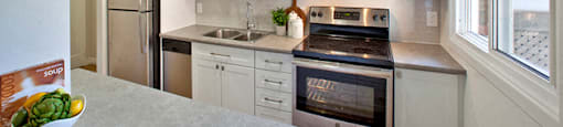 Whitby Place in Whitby, ON kitchen includes stainless steel appliances