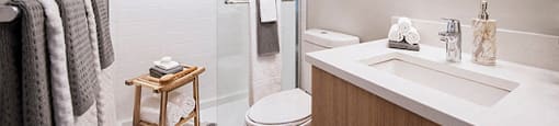 Yello On Yates sleek, modern bathroom with standing shower in Victoria, BC