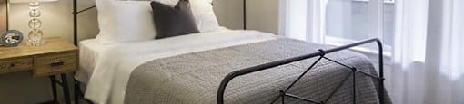 Bedroom With Expansive Windows at Parc West Apartments, Utah