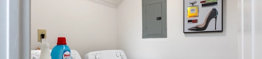A laundry room with a washer and dryer.
