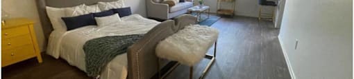 Bedroom with cozy bed at The Marquee Apartments, California 91605