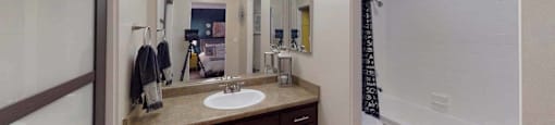 a bathroom with a sink at The Marquee Apartments, North Hollywood