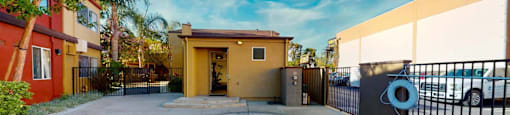 a small pool is in the middle of a house with a fence at The Marquee Apartments, North Hollywood, CA 91605