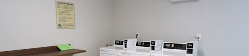 A laundry room with a washer and dryer.