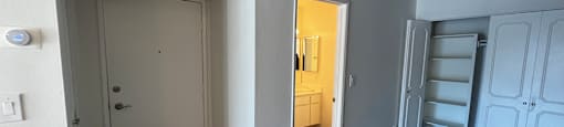 A room with white walls and wooden floors has two doors and a window.
