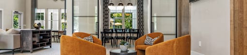 Langley Pointe Apartments | Clubhouse w/ Seating Area