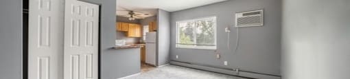 an open living room with a kitchen in Cleveland