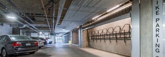 a parking garage with cars parked in it