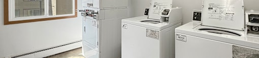 A laundry room with a washer and dryer.