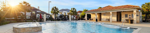 A sunny day at the outdoor swimming pool.
