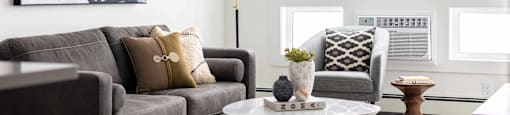 a living room with a couch and a coffee table