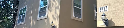 the side of a building with lights