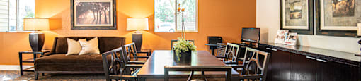 a dining room with a table and chairs at Eagles Landing Apartments, Everett, 98204