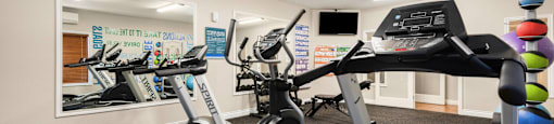 exercise equipment in the gym at meridian pointe apartments at Sage Apartments, Everett, 98204
