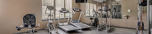 the gym at the landing at pullman apartments in pullman at Villas of Sorrento Apartments, Dallas