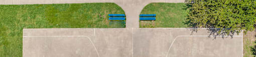 a aerial view of a basketball court in a park at Villas of Sorrento Apartments, Texas