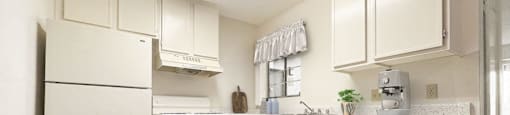 kitchen with white cabinets and appliances at Azul Apartments, Hemet, CA, 92545