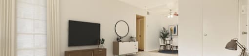 a living room with a couch and a coffee table and a television at Azul Apartments, Hemet, CA, 92545