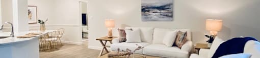 living room with a couch and a table at Mainstreet Apartments, Florida, 33756
