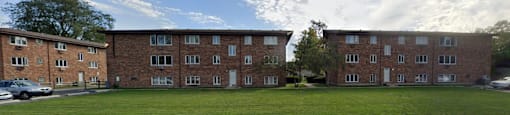 Building exterior and grassy area by parking at The Countryside, Countryside, IL 60525 ?