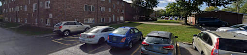 Exterior view of brick buildings and parking lot at The Countryside, Countryside, 60525 ?