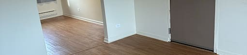 A room with a wooden floor and a ceiling fan.at The Countryside, Countryside ?