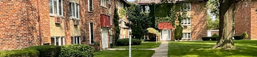 Walkways along buildings and grass at The Countryside, Countryside ?