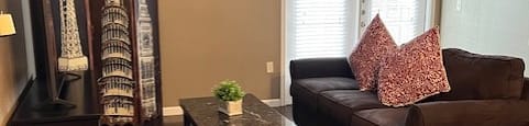 a living room with a couch and a table