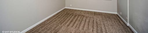 Bedroom with plush carpeting at 878 S Dexter St in Denver, CO
