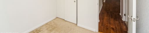 Bedroom with plush carpeting at Metropolis in Denver, CO