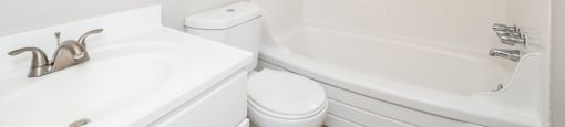 Bright white renovated bathroom at 1303 Columbine in Denver, CO