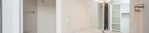 Bathroom with vanity storage at 878 S Dexter St in Denver, CO