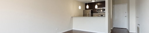 Spacious living area with upgraded flooring
