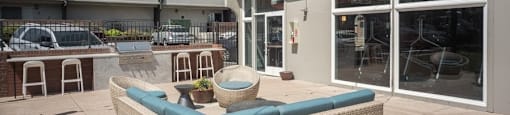 Upgraded shared patio space with grills and outdoor seating at 878 S Dexter St in Denver, CO