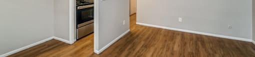 Renovated apartment home with gorgeous wood-like flooring at 1303 Columbine in Denver, CO