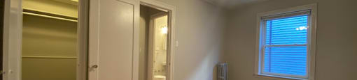 Hardwood flooring and a ceiling fan - Charlie Chaplin One Bedroom